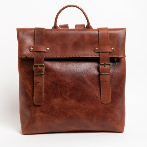 Elegant tan leather flat rucksack for men
