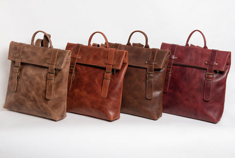 Elegant brown leather flat rucksack for women
