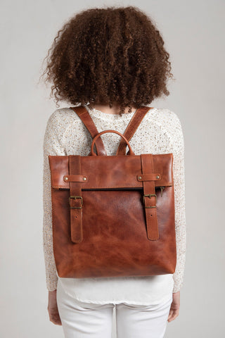 Elegant brown leather flat rucksack for women