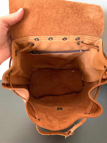 Medium leather unisex rucksack with external pockets